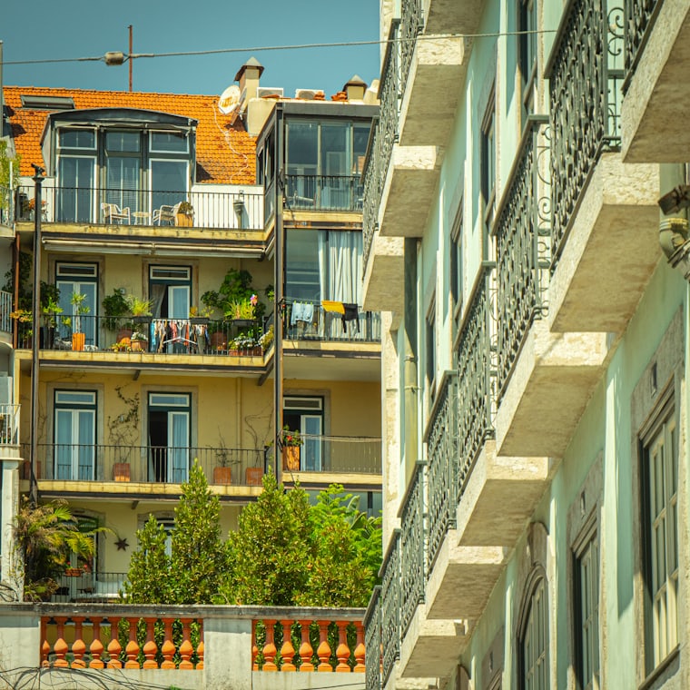 Apartment buildings with balconies and windows